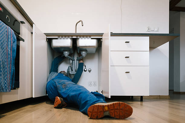 Professional Drain Cleaning technician working in Eola, IL